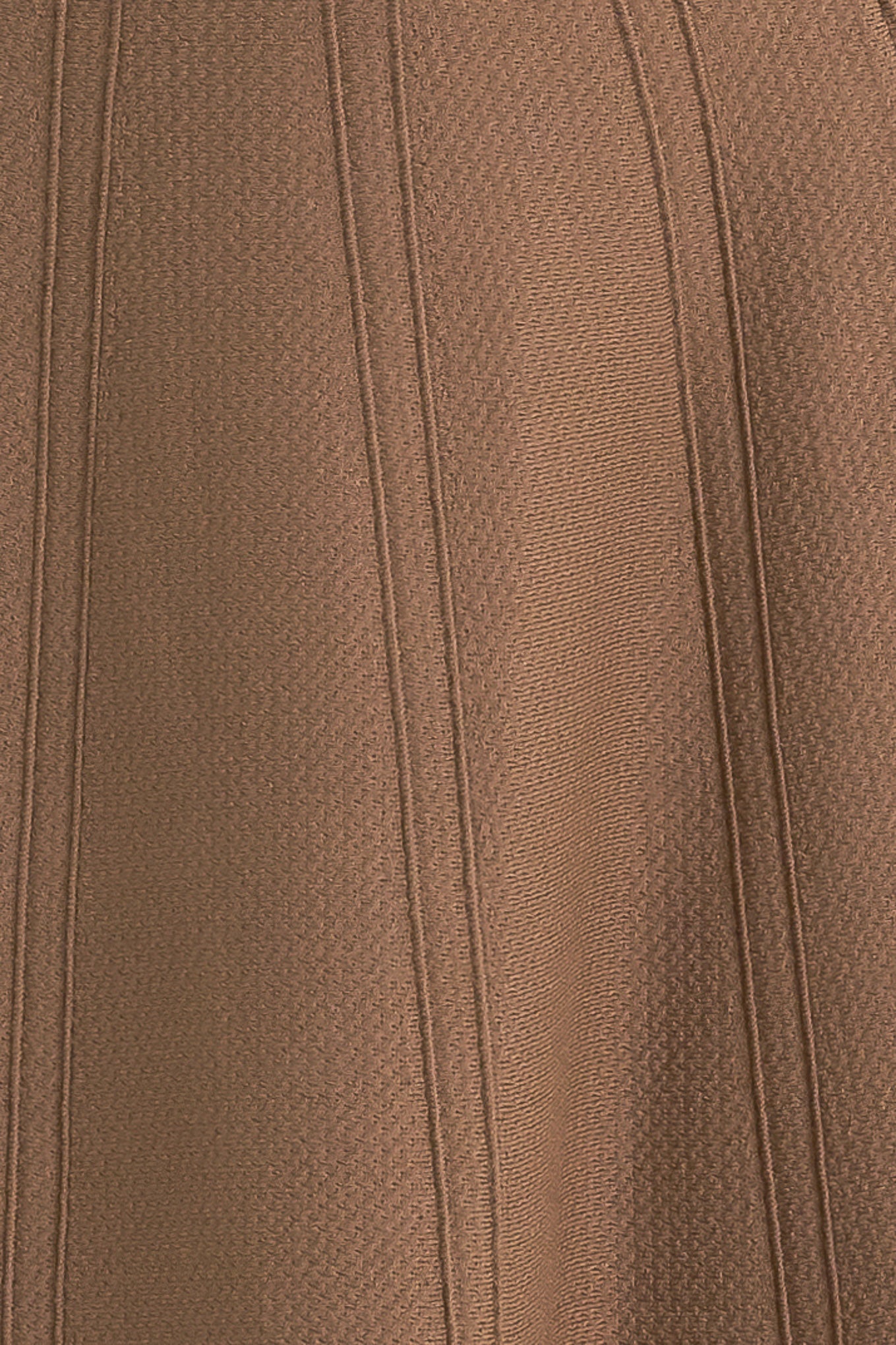 This skirt features a camel-colored sweater knit fabric crafted in a circular silhouette.