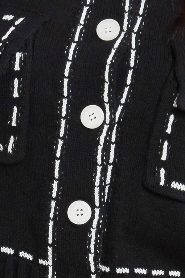 A sweater knit top featuring round neckline, button down, long sleeve and stitch edge detail
