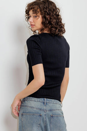 A ribbed sweater knit top featuring round neckline, front button closure and short sleeve