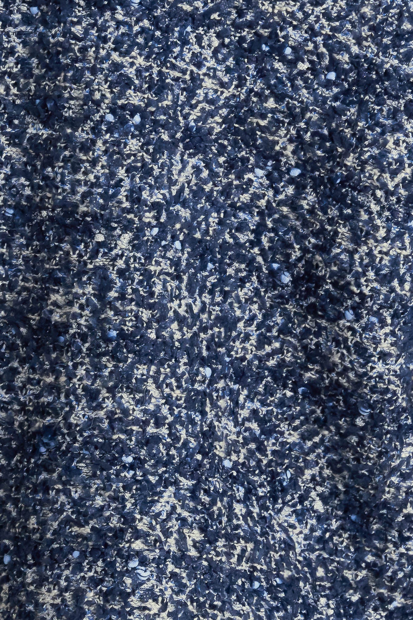 A sweater knit cardigan with front button closure