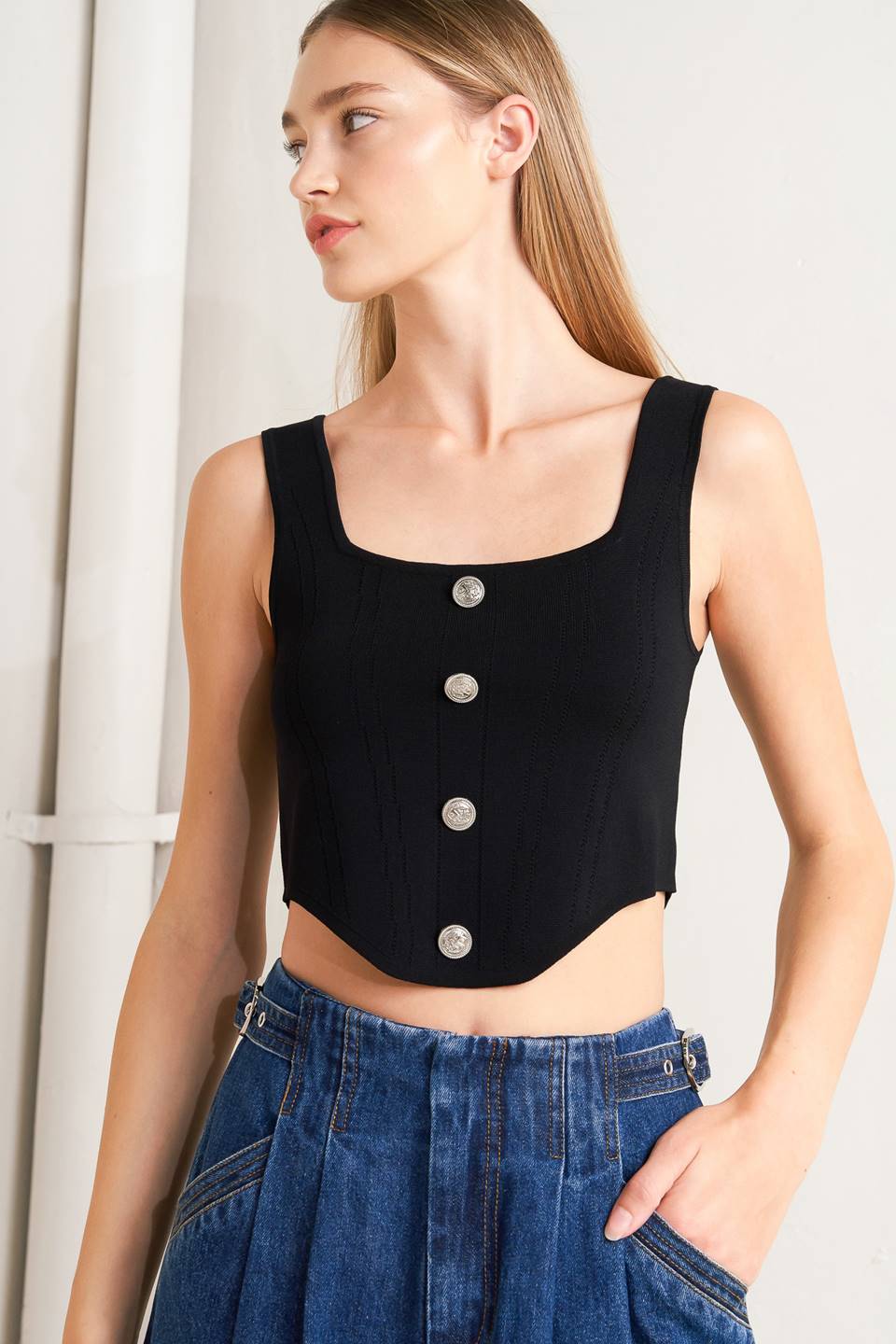 A sweater top featuring square neckline, sleeveless and button front detail