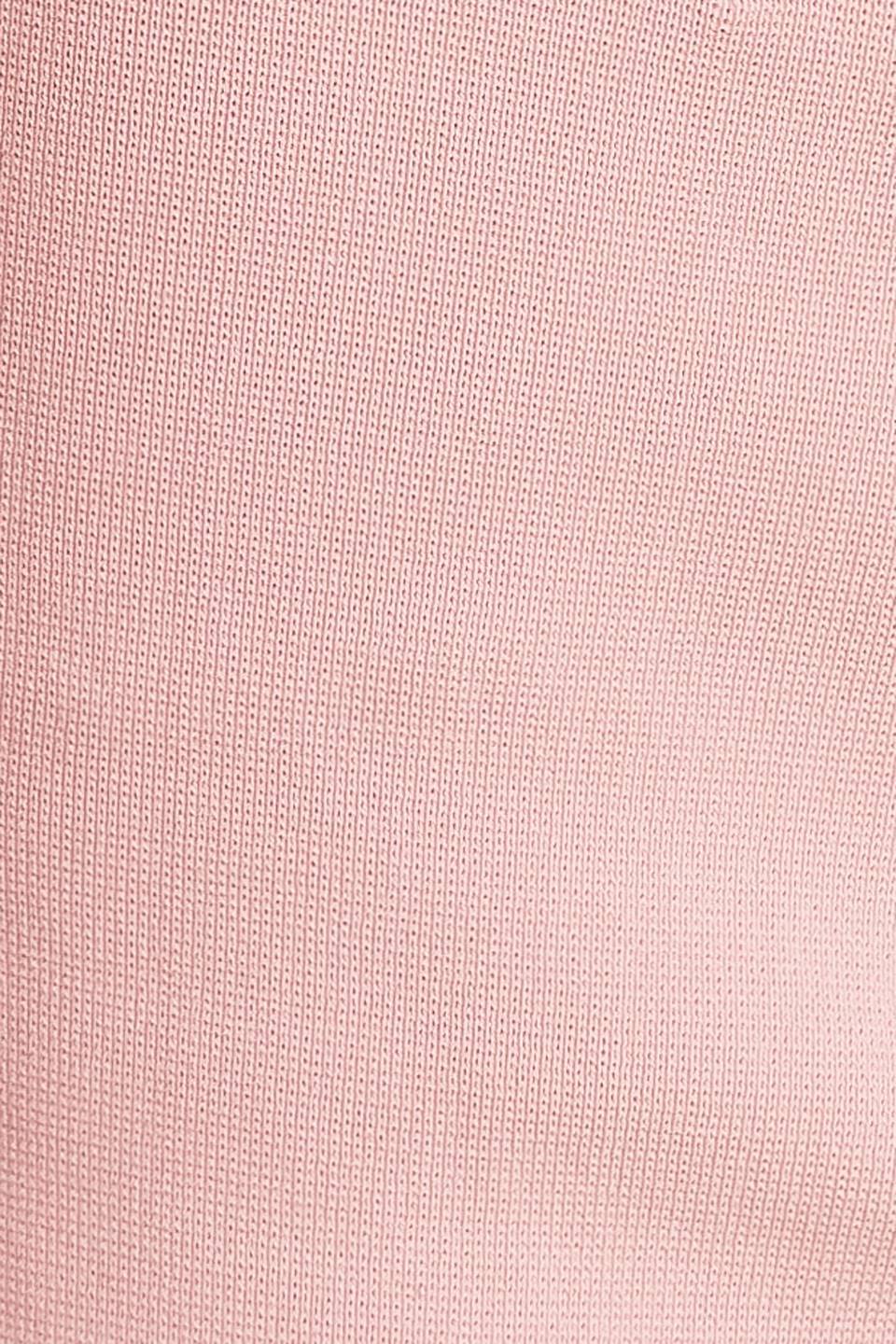 A sweater top featuring square neckline, sleeveless and button front detail