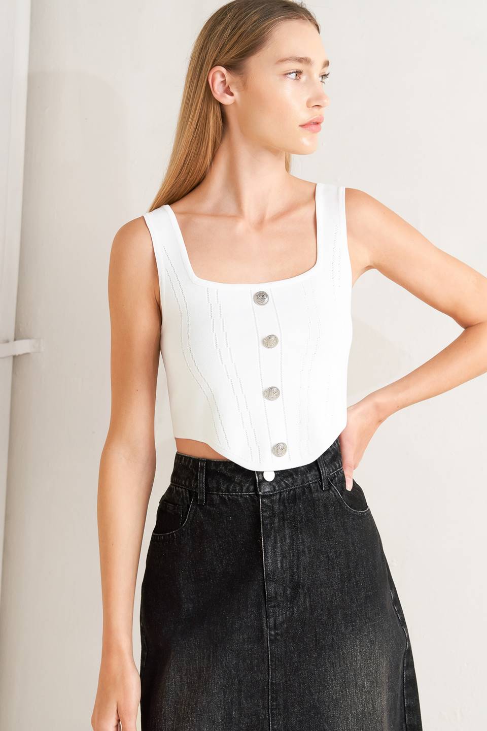 A sweater top featuring square neckline, sleeveless and button front detail