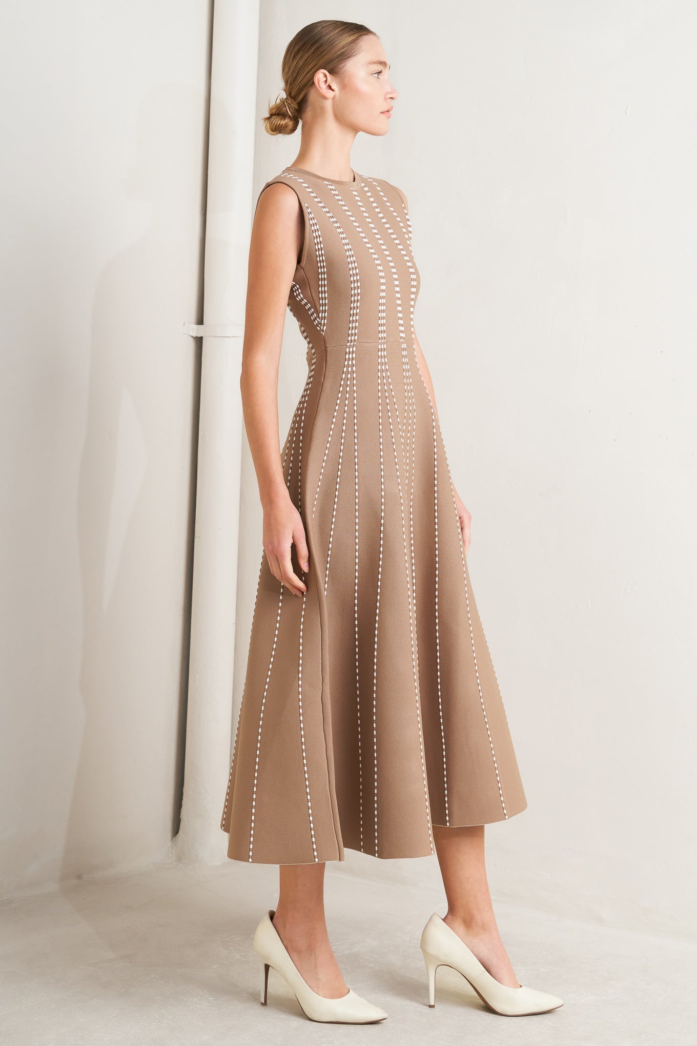 
A jacquard sweater knit midi dress featuring round neckline, sleeveless and circle skirt

Details:

Self : 82% Polyester 18% Spandex

Size &amp; Fit

- Model is 5`8" And Wearing Size Small
- Measurements Taken From Size Small
- Approx. Length: 50" Flying Tomato