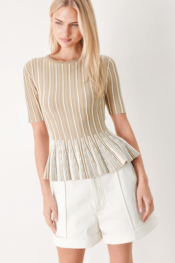 Woman wearing a taupe and white striped sweater knit top with a peplum waist | FREEMARKET