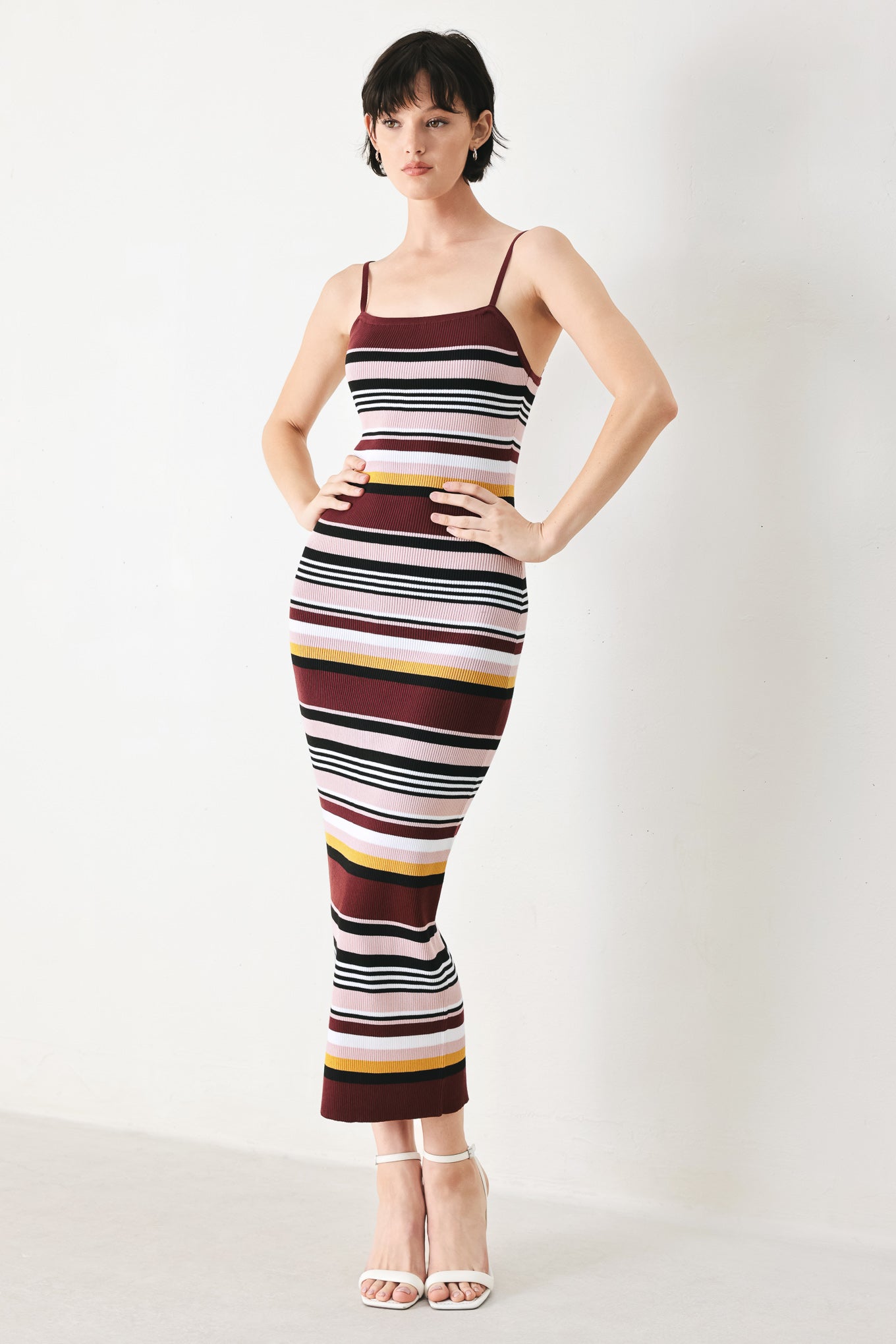 Woman wearing a ribbed sweater knit midi tank dress | FREEMARKET