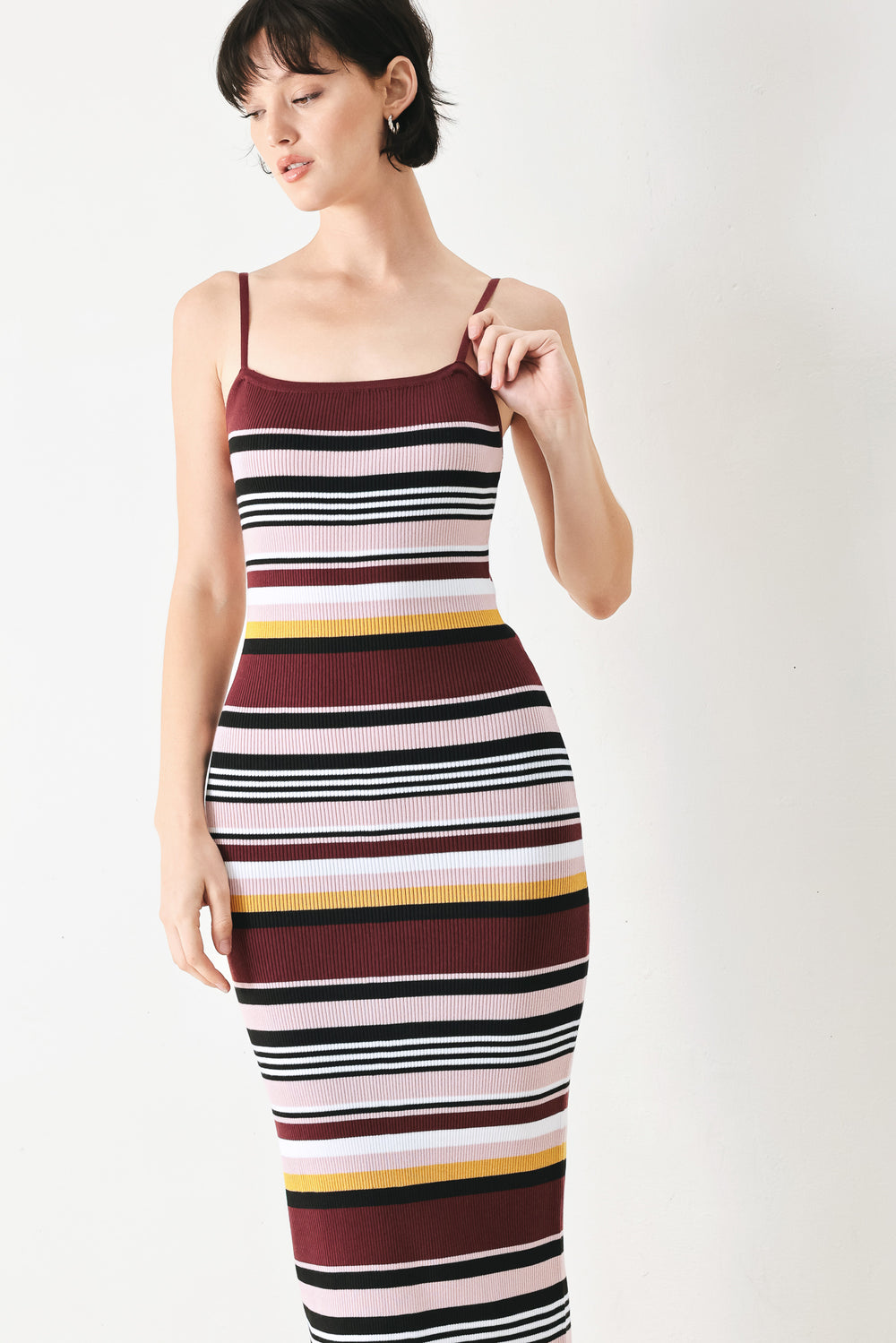 Woman wearing a ribbed sweater knit midi tank dress | FREEMARKET