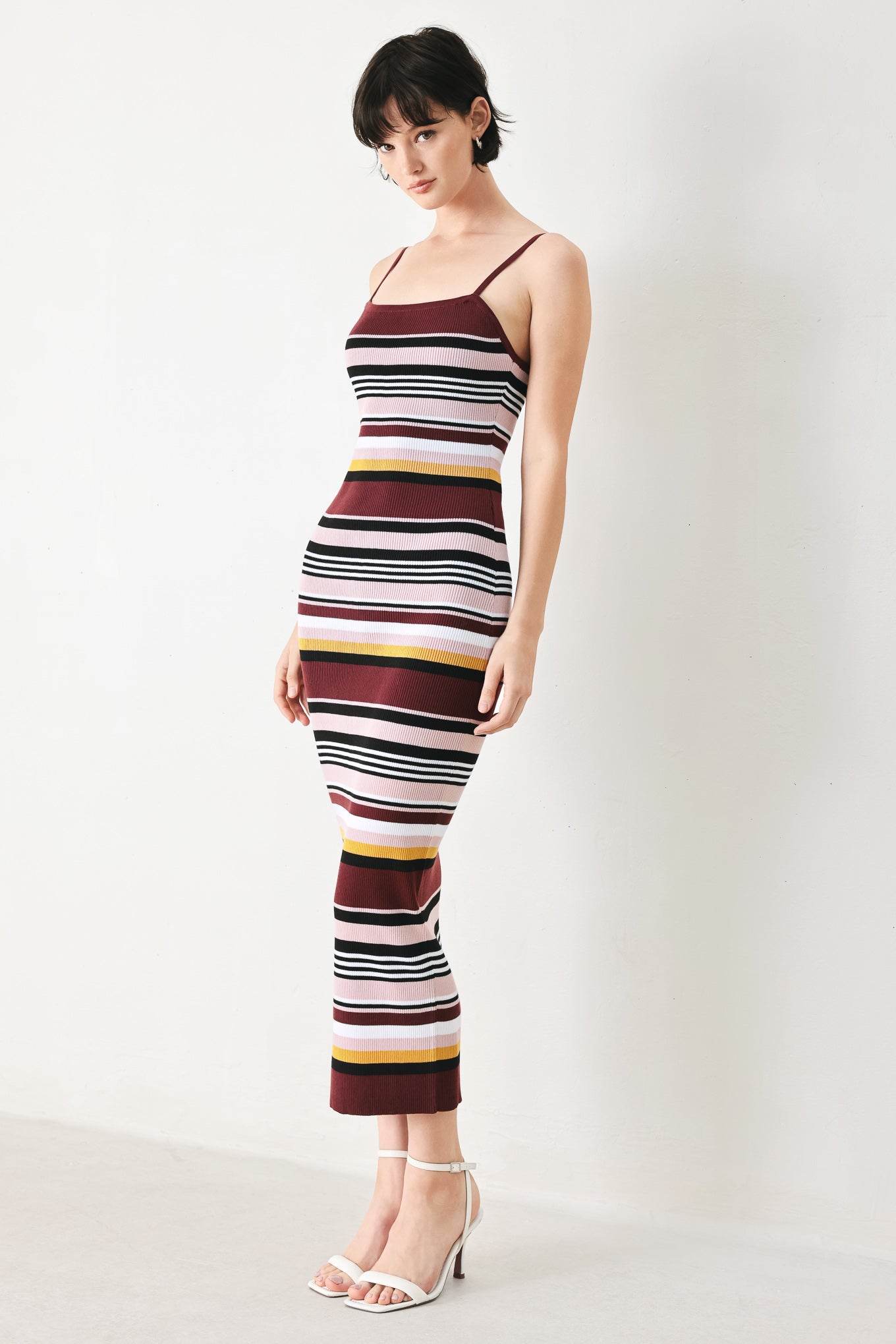 Woman wearing a ribbed sweater knit midi tank dress | FREEMARKET