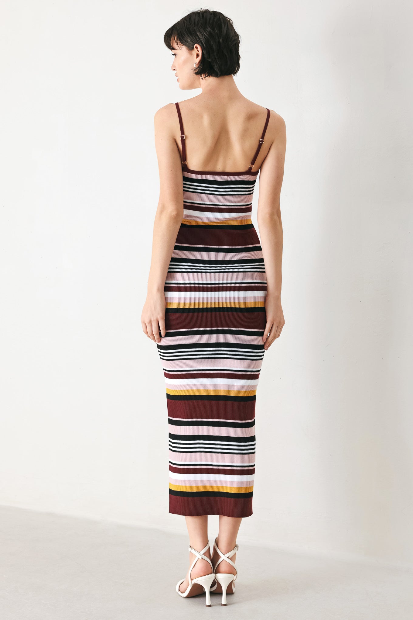 Woman wearing a ribbed sweater knit midi tank dress | FREEMARKET