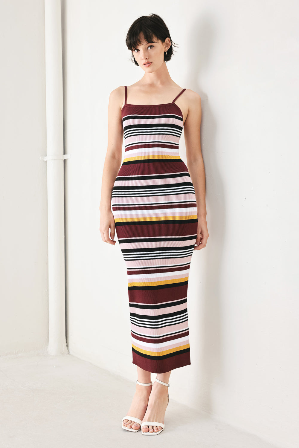 Woman wearing a ribbed sweater knit midi tank dress | FREEMARKET