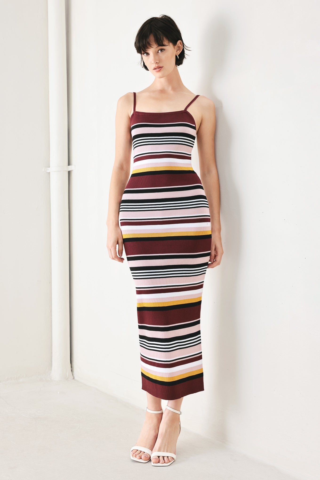 Woman wearing a ribbed sweater knit midi tank dress | FREEMARKET