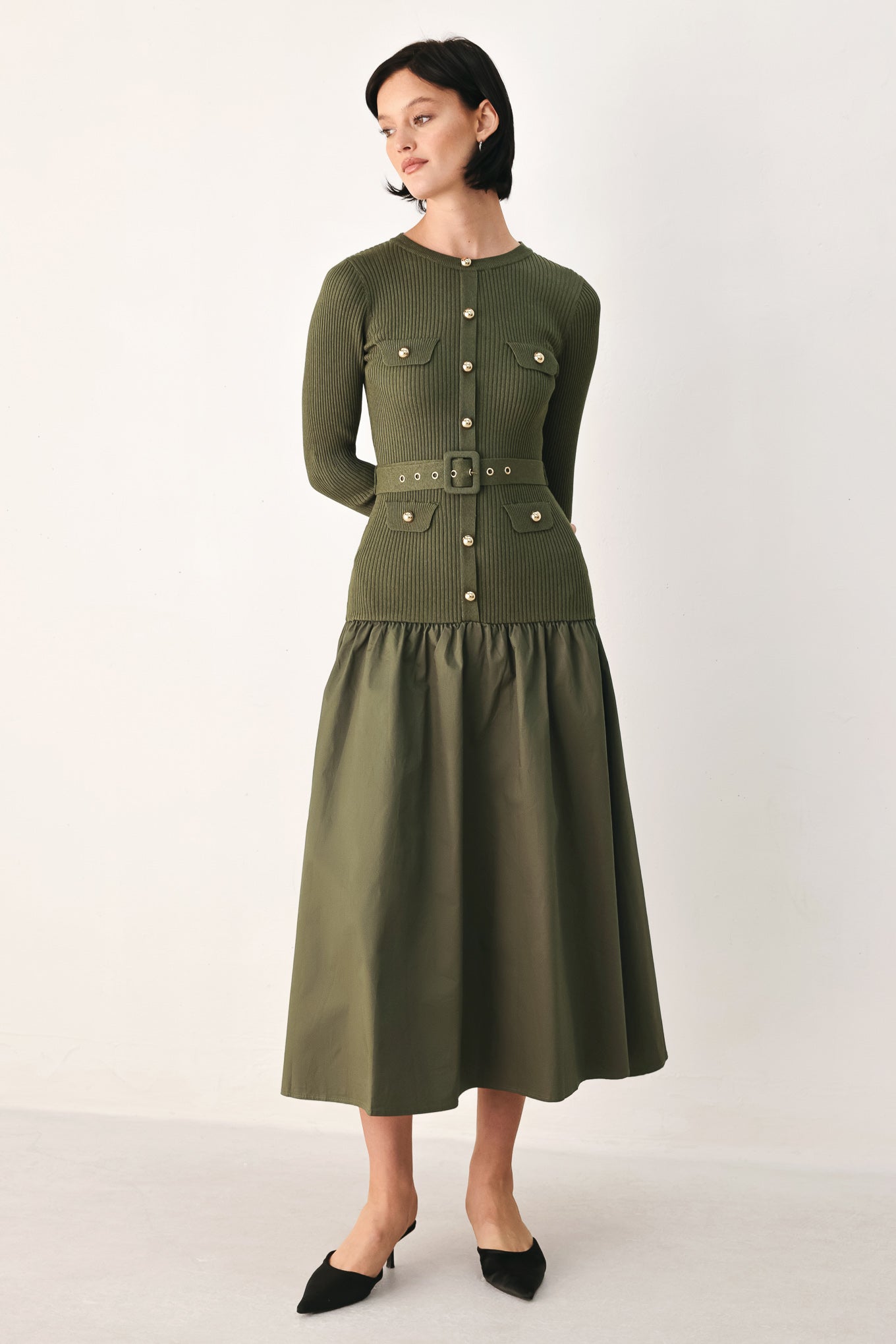 A woman models an olive green ribbed midi dress with a matching belt and gold-tone buttons, and a flared drop-waist skirt | FREEMARKET