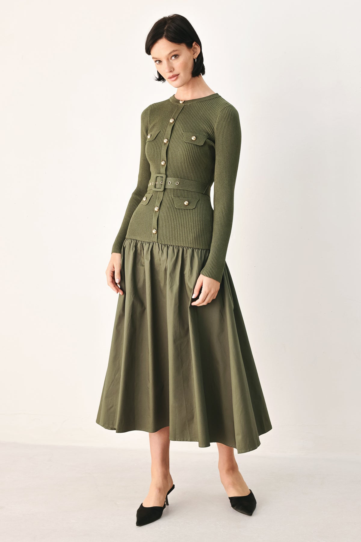 A woman models an olive green ribbed midi dress with a matching belt and gold-tone buttons, and a flared drop-waist skirt | FREEMARKET