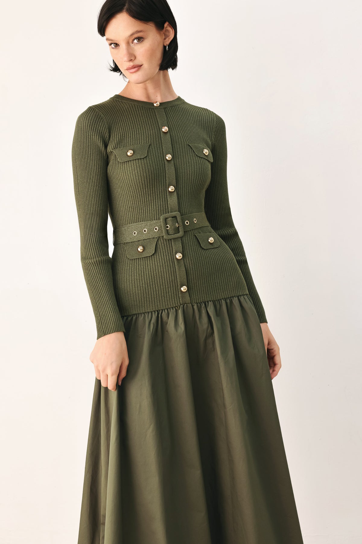 A woman models an olive green ribbed midi dress with a matching belt and gold-tone buttons, and a flared drop-waist skirt | FREEMARKET