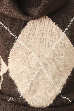 A woman wearing a brown and beige argyle knit sweater with a high folded collar | FREEMARKET