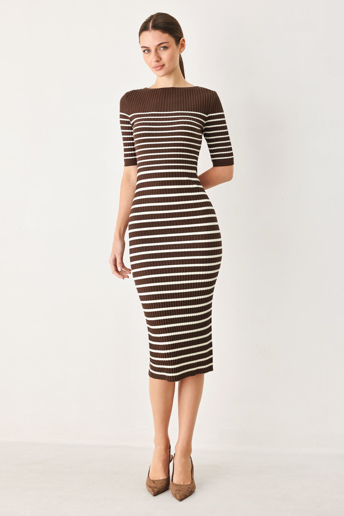 A ribbed sweater knit midi dress with wide leg and short sleeve