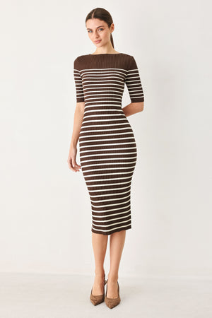 Woman wearing a brown and white horizontal stripped ribbed sweater knit midi dress | FREEMARKET