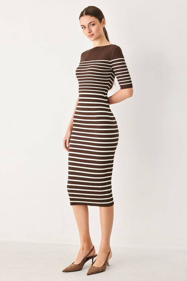 Woman wearing a brown and white horizontal stripped ribbed sweater knit midi dress | FREEMARKET
