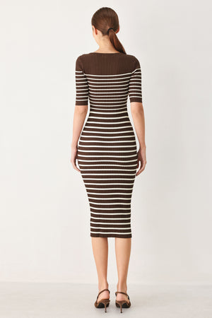 Woman wearing a brown and white horizontal stripped ribbed sweater knit midi dress | FREEMARKET