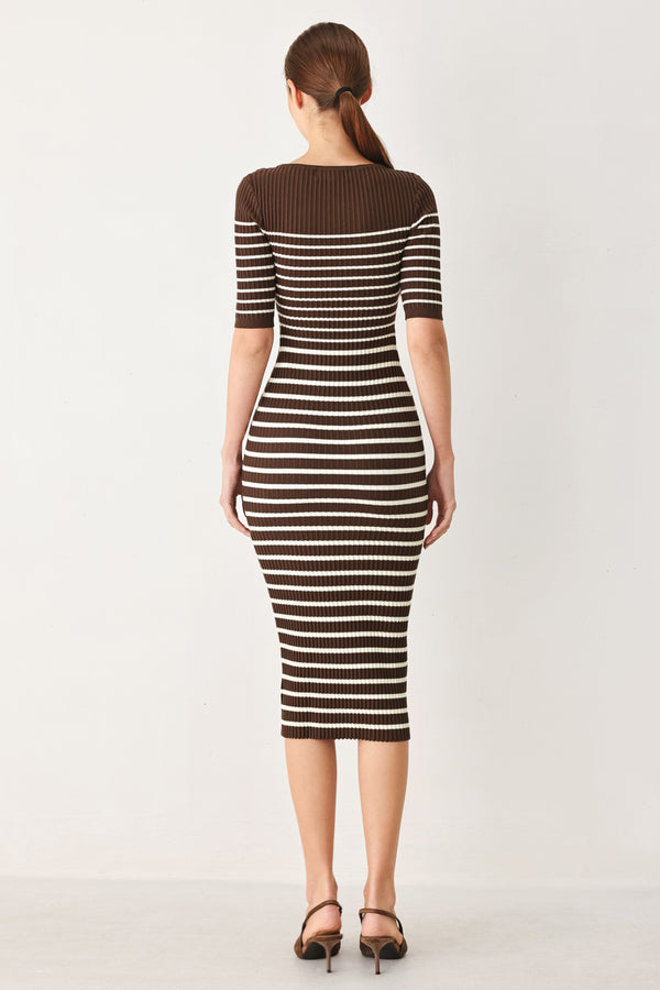 Woman wearing a brown and white horizontal stripped ribbed sweater knit midi dress | FREEMARKET