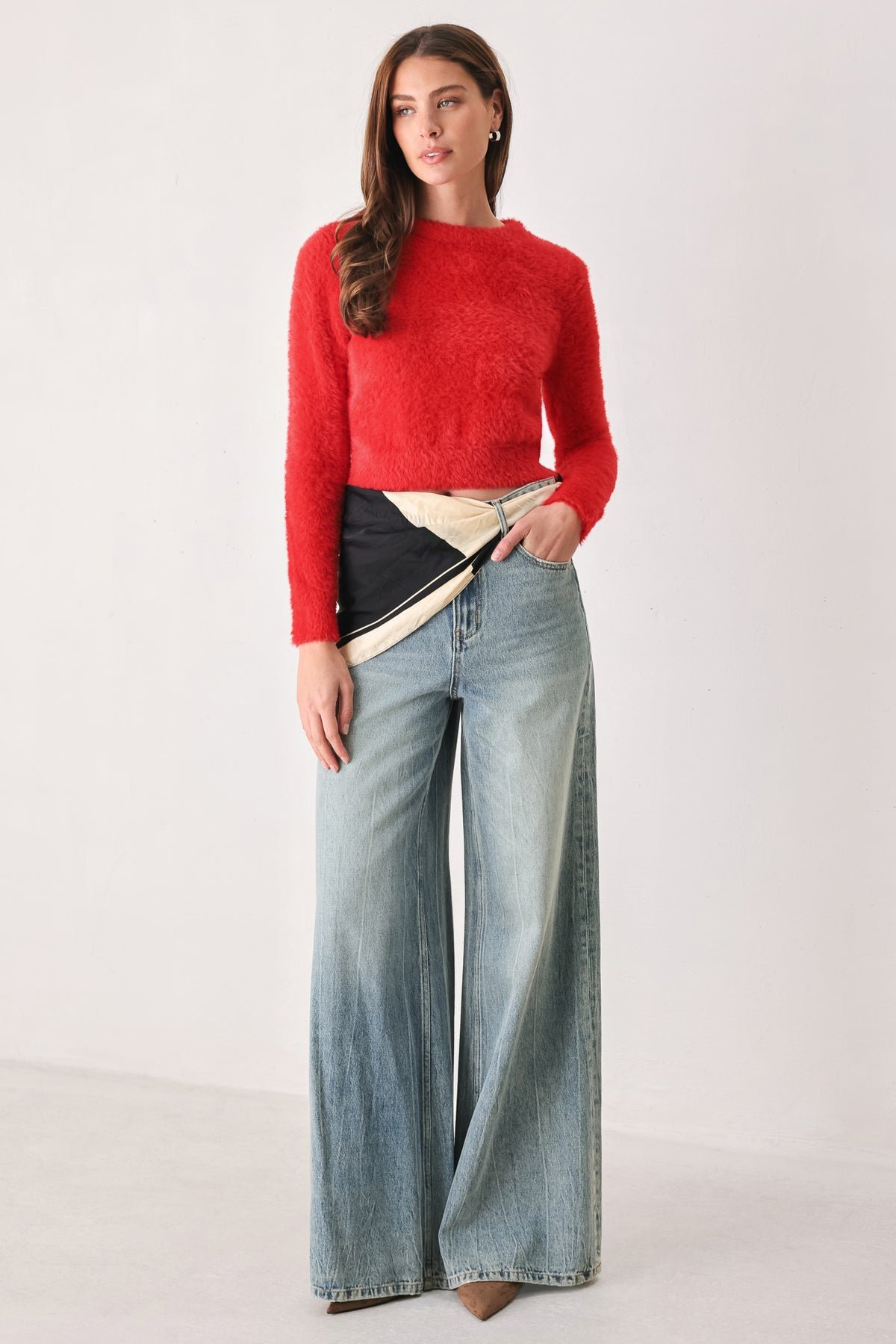 A woman wearing a fuzzy, textured red long-sleeve crop sweater | FREEMARKET