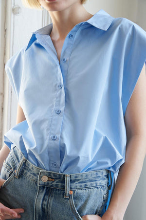 MUCH TO CELEBRATE POPLIN TOP.