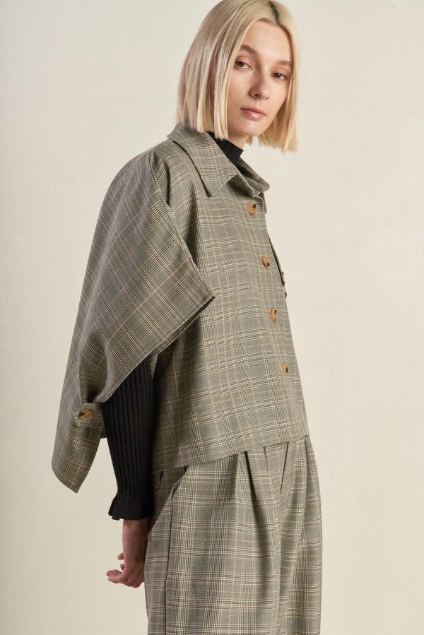 IMMACULATE EXCELLENCE WOVEN PLAID TOP.