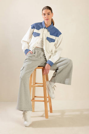 KEEP IT GOING WOVEN AND DENIM SHIRT.