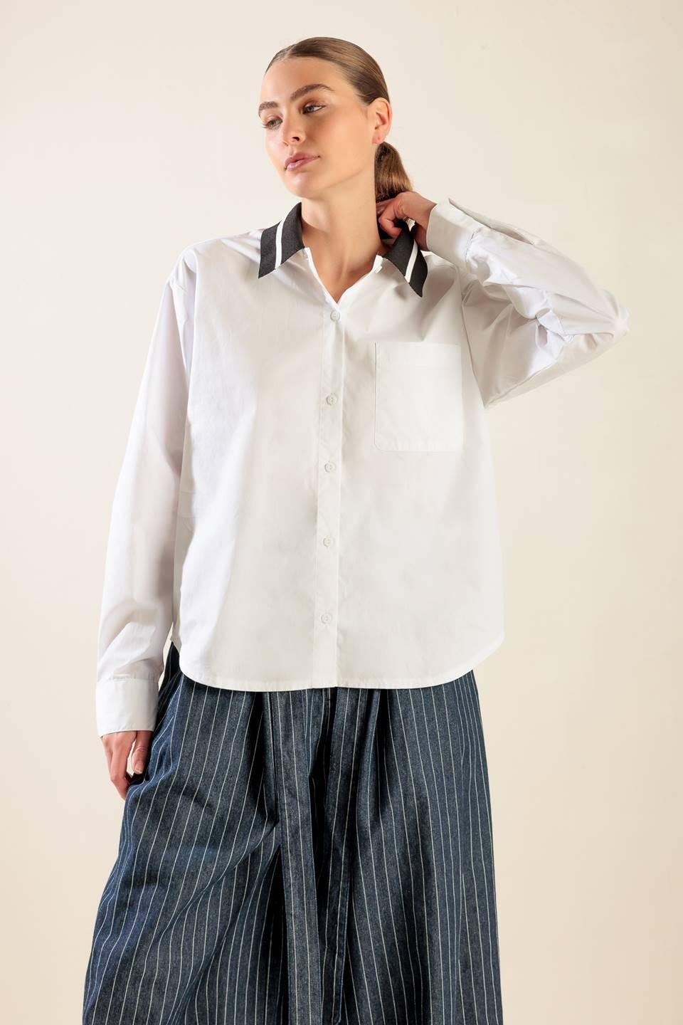 CAUSE A COMMOTION WOVEN TOP.