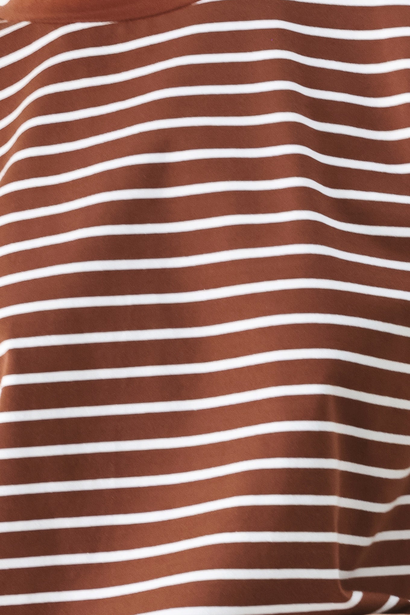 Close up of a brown and white striped knit top with crew neckline, sleeveless and should button detail | FREEMARKET