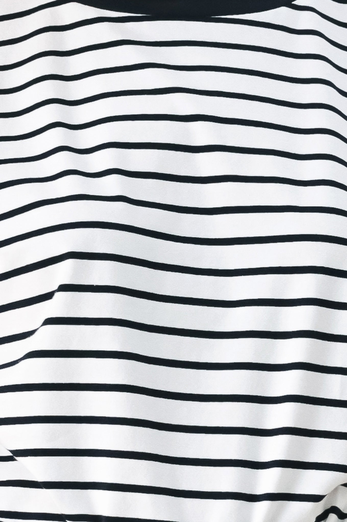 Close up of a navy and white striped knit top with crew neckline, sleeveless and should button detail | FREEMARKET