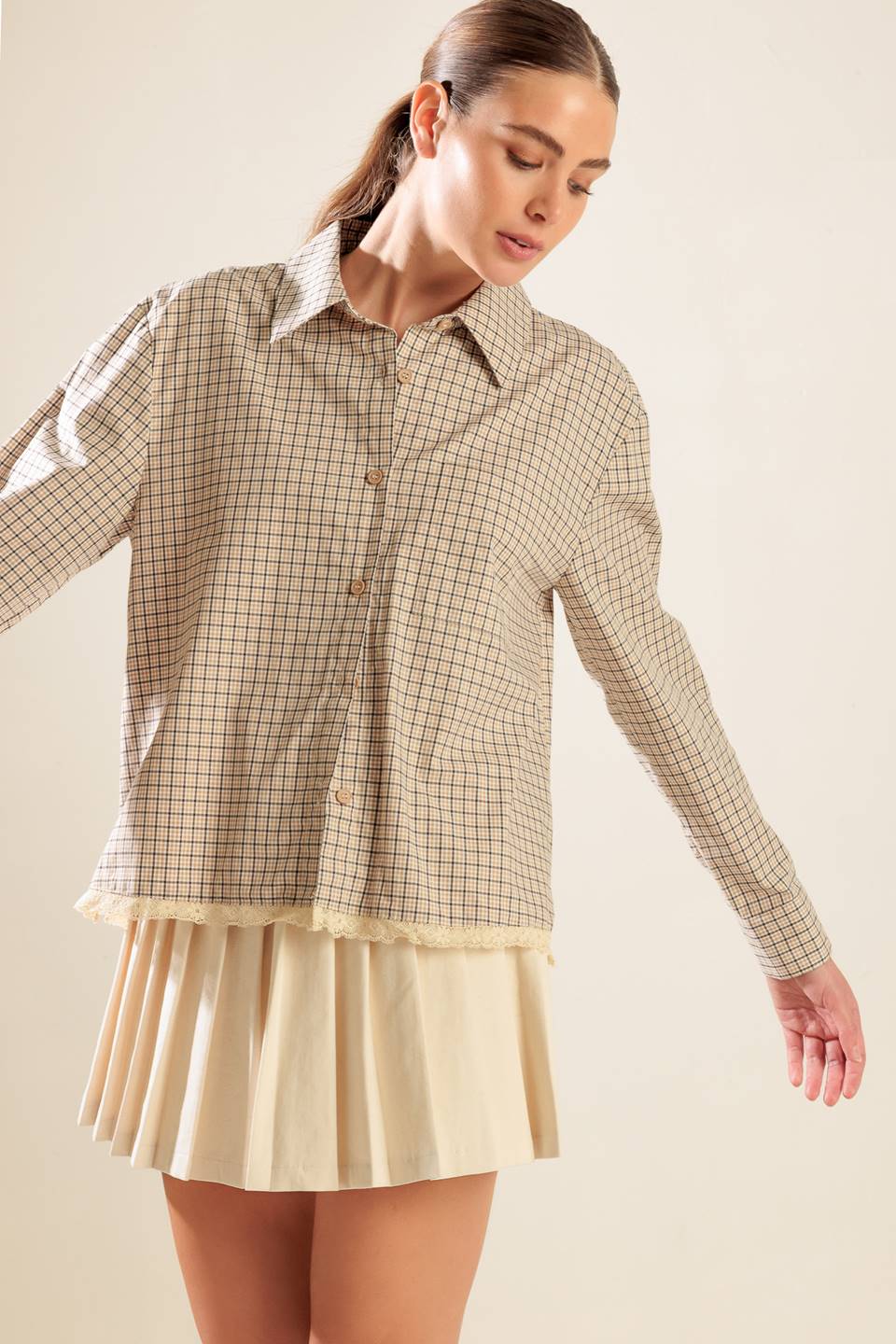 A plaid woven top featuring button down, long sleeve and lace trim hemline
Details:
Self : 100% Cotton
(exclusive of decoration)
Size & Fit
- Model is 5`8" And Wearing Size Small
- Measurements Taken From Size Small
- Approx. Length: 24"