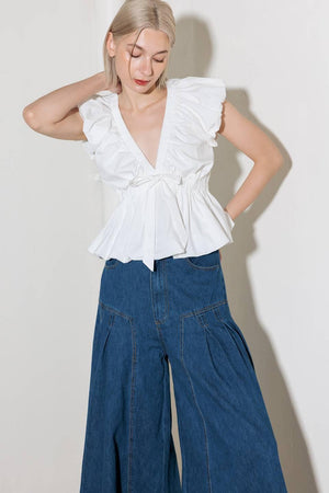 SLOW DOWN IN WHITE WOVEN TOP.