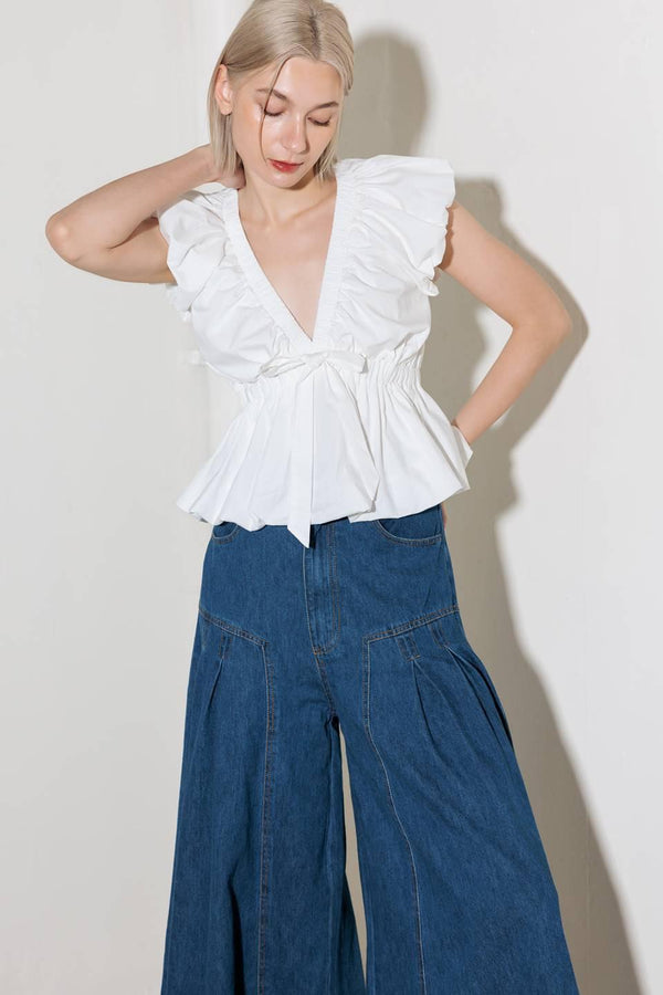 SLOW DOWN IN WHITE WOVEN TOP.