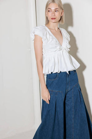 SLOW DOWN IN WHITE WOVEN TOP.