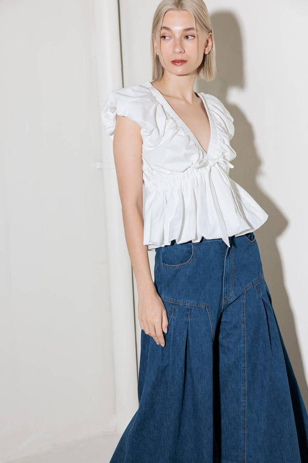 SLOW DOWN IN WHITE WOVEN TOP.