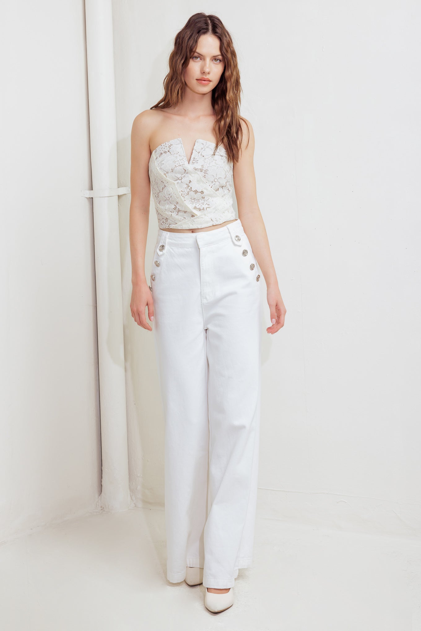 A woven lace tube top with smocked back bodice. Matching skirt FK1176