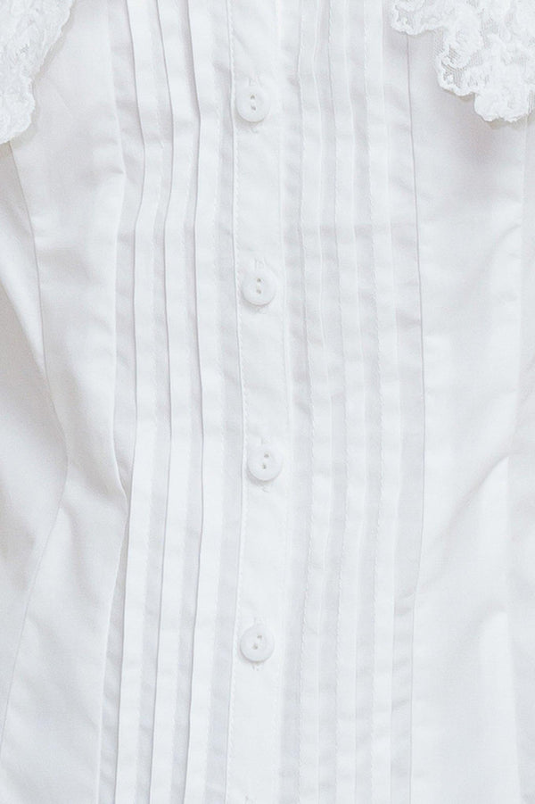 A solid woven top featuring V neckline, peter pan collar with lace trim, sleeveless, pin tuck front and button down closure