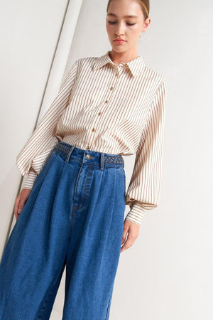 A striped woven top featuring collar, long sleeve and front button down
