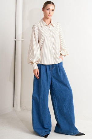 A striped woven top featuring collar, long sleeve and front button down