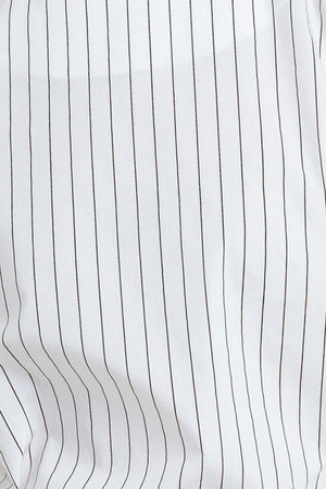 A striped woven top featuring round neckline, short puff sleeve with cuff and back button down closure