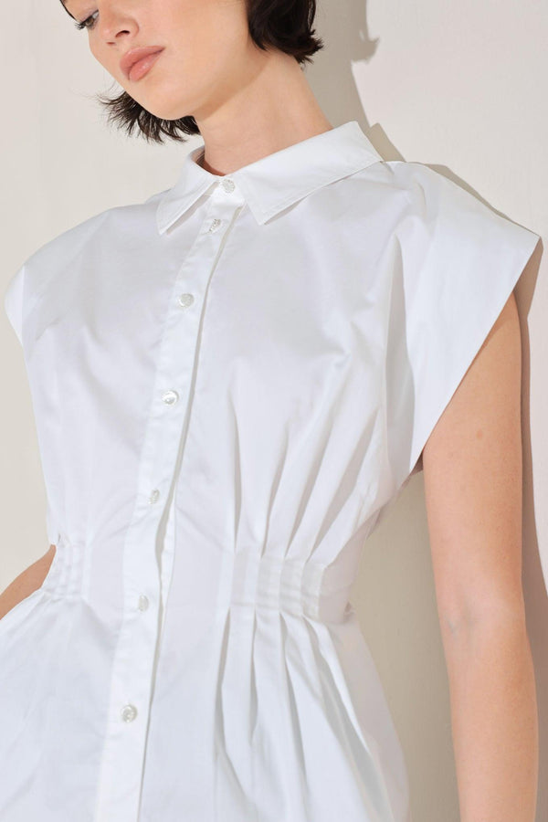MODERN POISE WOVEN TOP.