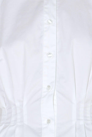 MODERN POISE WOVEN TOP.