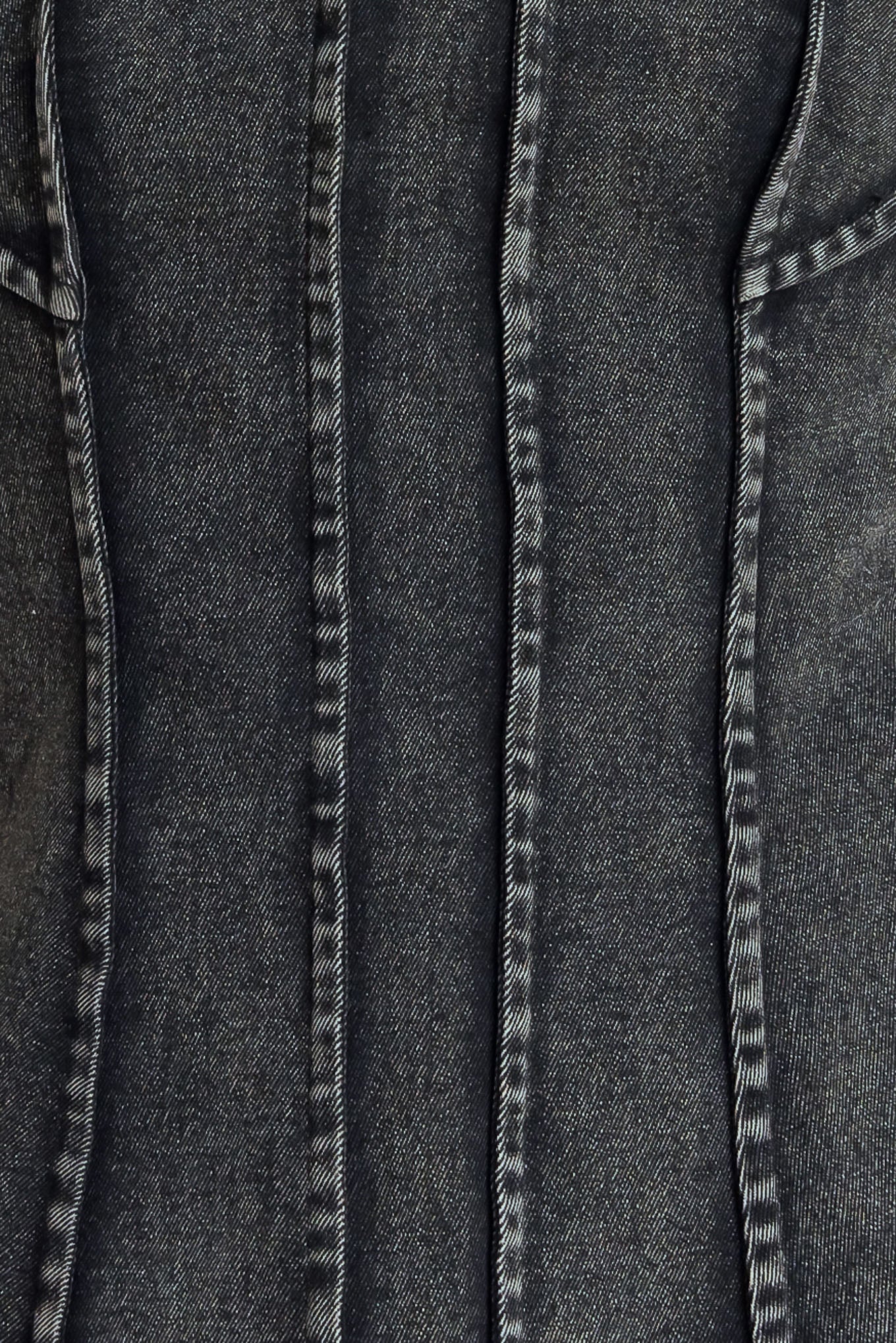 A washed denim top featuring strapless neckline and back zipper closure