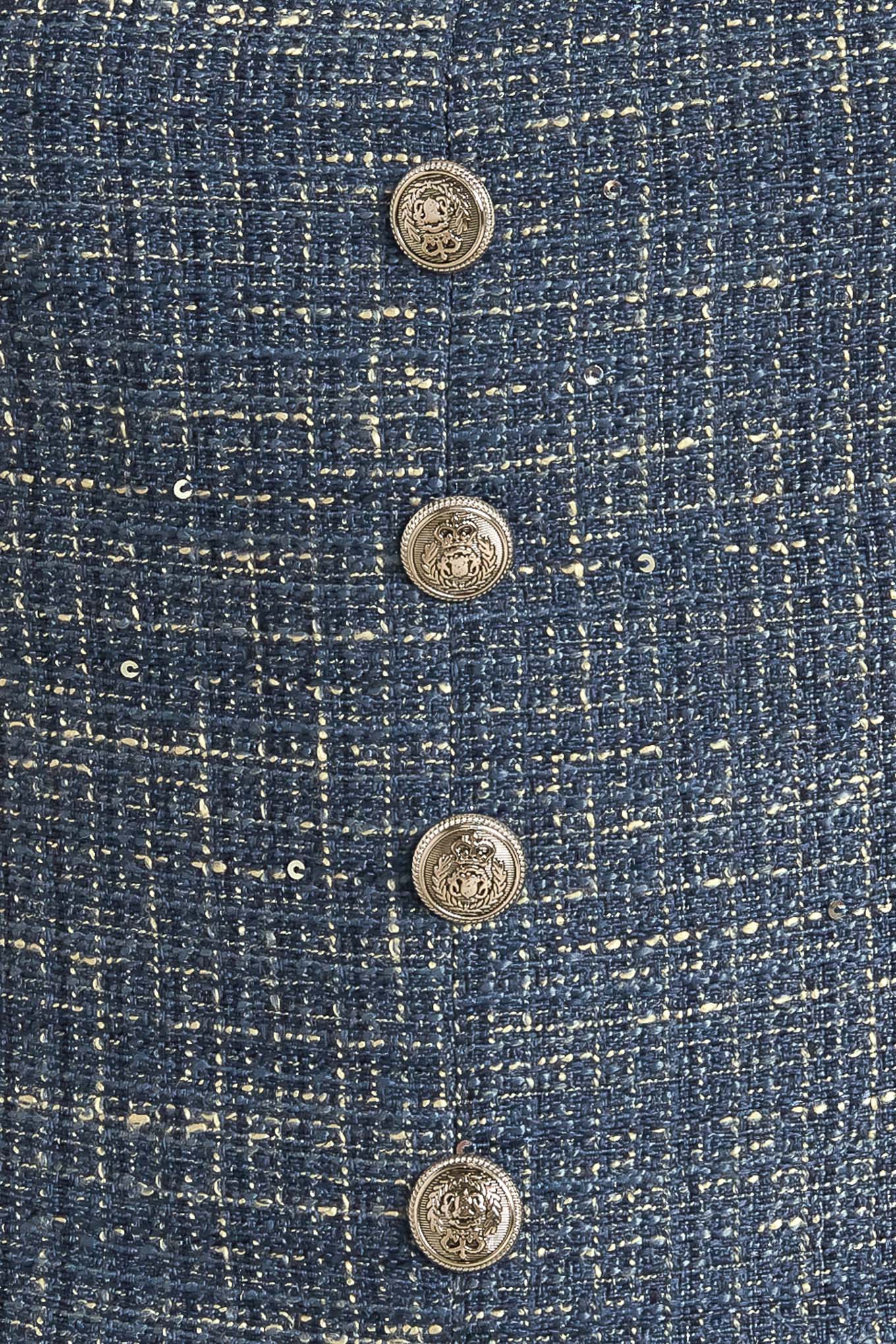 A tweed top featuring square neckline, sleeveless, button down detail and back zipper closure