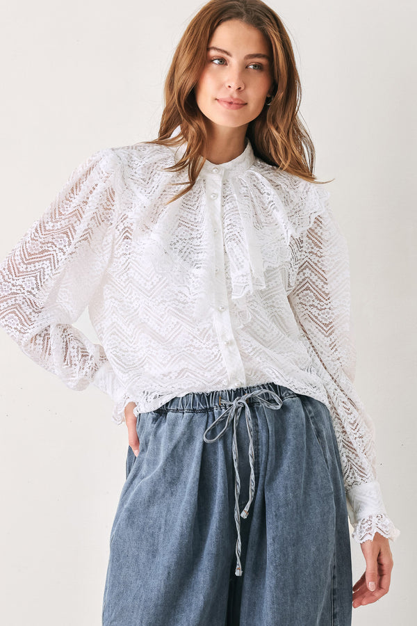 A woman wearing a white long-sleeve lace blouse with a ruffled collar | FREEMARKET