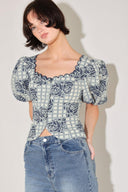 
A woven jacquard top featuring square neckline with scallop edge, short puff sleeve and button down.&nbsp;

Details:

Self : 60% Cotton 40% Polyester

Size &amp; Fit

- Model is 5`8" And Wearing Size Small
- Measurements Taken From Size Small
- Approx. Length: 19"