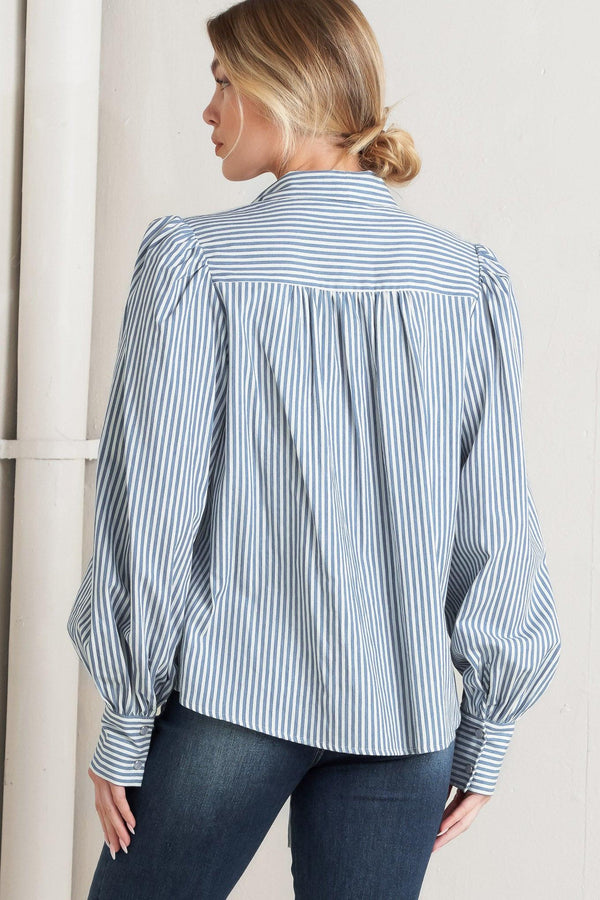 A striped woven top featuring bow tie front, button down and long sleeve with wide cuff

Details:

Self: 100% Cotton

Size & Fit

- Model is 5`8" And Wearing Size Small
- Measurements Taken From Size Small
- Approx. Length: 25"