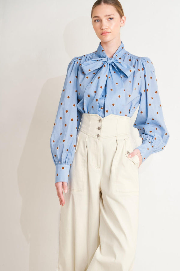 
A printed woven top featuring front tie, button down and long sleeve with wide cuff

Details:

Self : 100% Cotton

Size &amp; Fit

- Model is 5`8" And Wearing Size Small
- Measurements Taken From Size Small
- Approx. Length: 26"