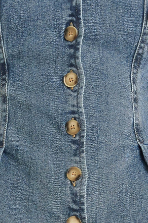 A washed denim top featuring V neckline, short sleeve, front button sown and peplum. Matching pant FP1946

Details:

Self: 99% Cotton 1% Spandex

Size & Fit

-Model is 5`8" And Wearing Size Small
-Measurements Taken From Size Small
-Approx. Length: 23"
